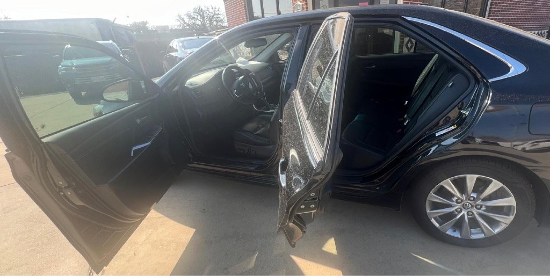 2015 BLACK TOYOTA CAMRY HYBRID (4T1BD1FK3FU) with an 2.5L engine, Continuously Variable transmission, located at 4415 NE 28th St, Haltom City, TX, 76117, (817) 222-9334, 32.795322, -97.280937- Photo#9
