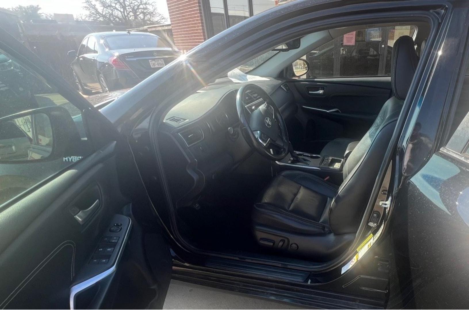 2015 BLACK TOYOTA CAMRY HYBRID (4T1BD1FK3FU) with an 2.5L engine, Continuously Variable transmission, located at 4415 NE 28th St, Haltom City, TX, 76117, (817) 222-9334, 32.795322, -97.280937- Photo#10
