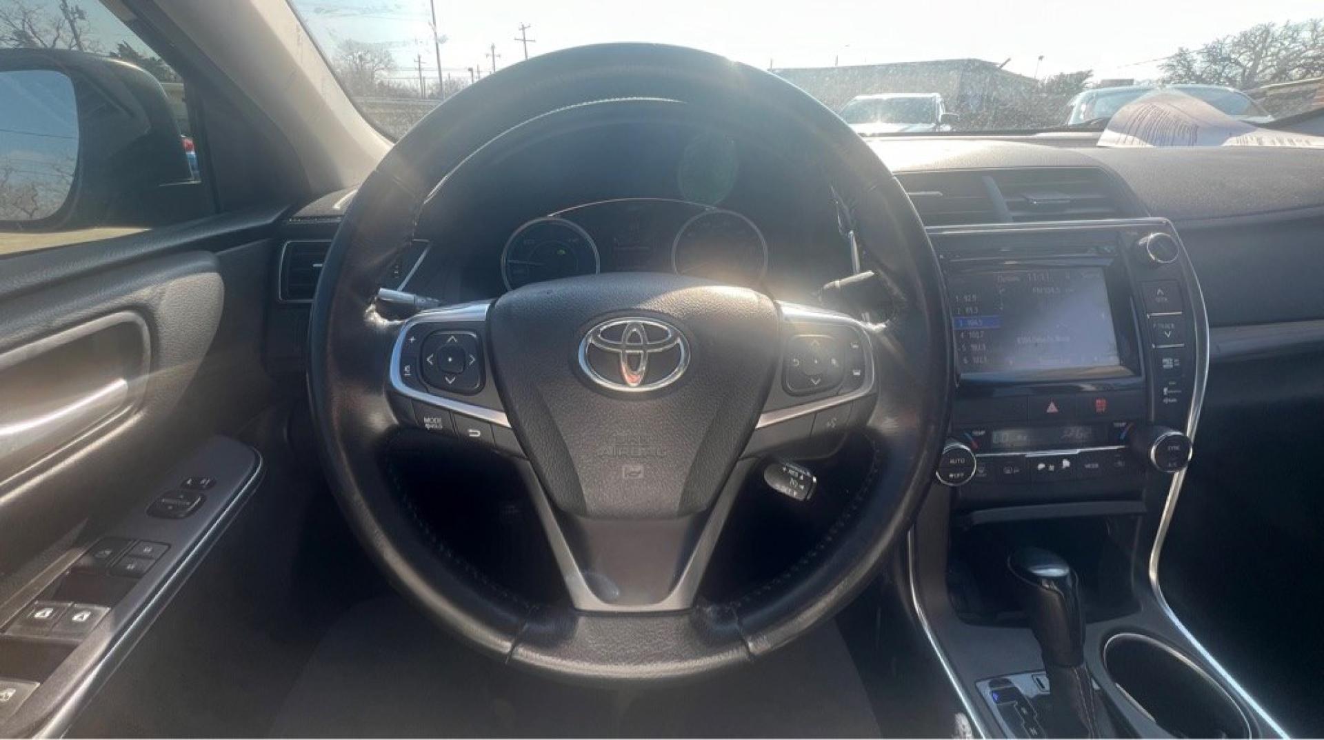 2015 BLACK TOYOTA CAMRY HYBRID (4T1BD1FK3FU) with an 2.5L engine, Continuously Variable transmission, located at 4415 NE 28th St, Haltom City, TX, 76117, (817) 222-9334, 32.795322, -97.280937- Photo#12