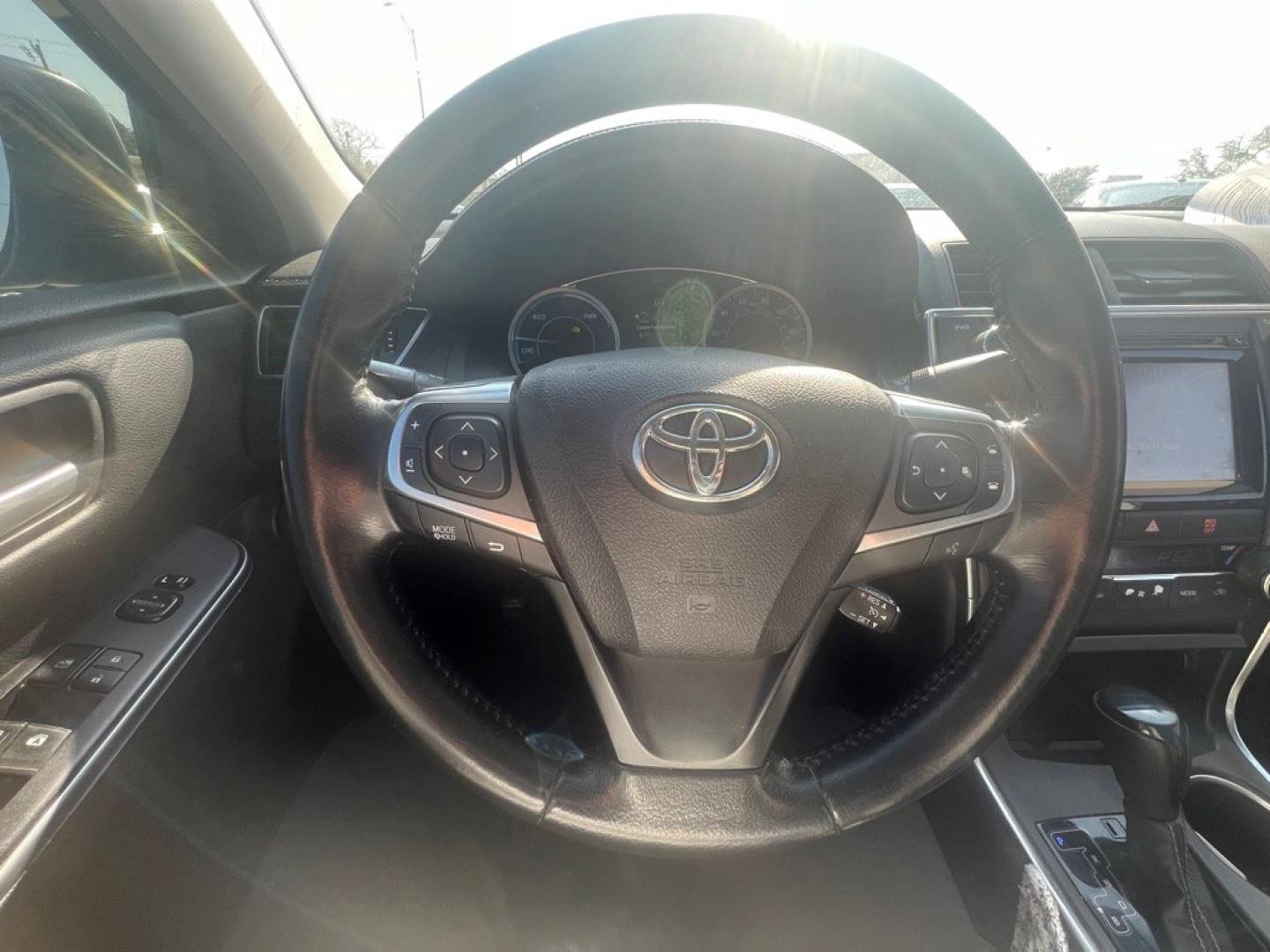 2015 BLACK TOYOTA CAMRY HYBRID (4T1BD1FK3FU) with an 2.5L engine, Continuously Variable transmission, located at 4415 NE 28th St, Haltom City, TX, 76117, (817) 222-9334, 32.795322, -97.280937- Photo#13