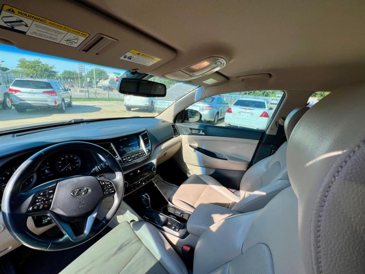 2016 Maroon HYUNDAI TUCSON LIMITED (KM8J33A28GU) with an 1.6L engine, Automatic transmission, located at 4415 NE 28th St, Haltom City, TX, 76117, (817) 222-9334, 32.795322, -97.280937 - Photo#6