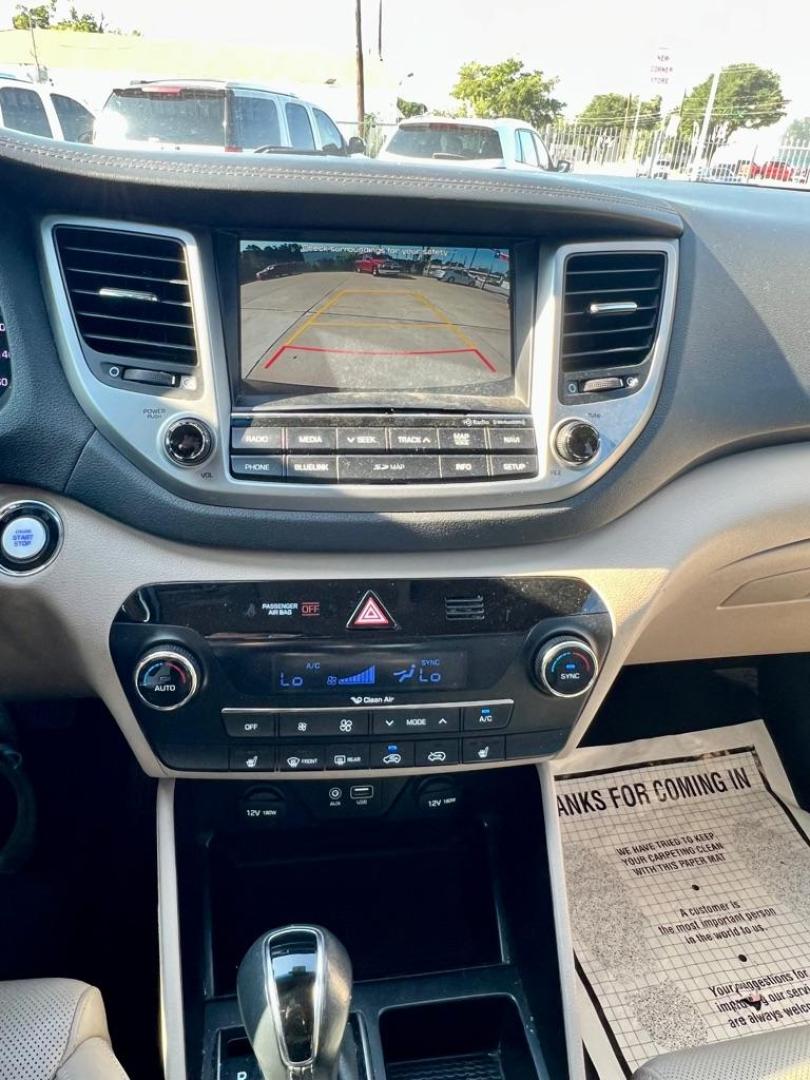 2016 Maroon HYUNDAI TUCSON LIMITED (KM8J33A28GU) with an 1.6L engine, Automatic transmission, located at 4415 NE 28th St, Haltom City, TX, 76117, (817) 222-9334, 32.795322, -97.280937 - Photo#8