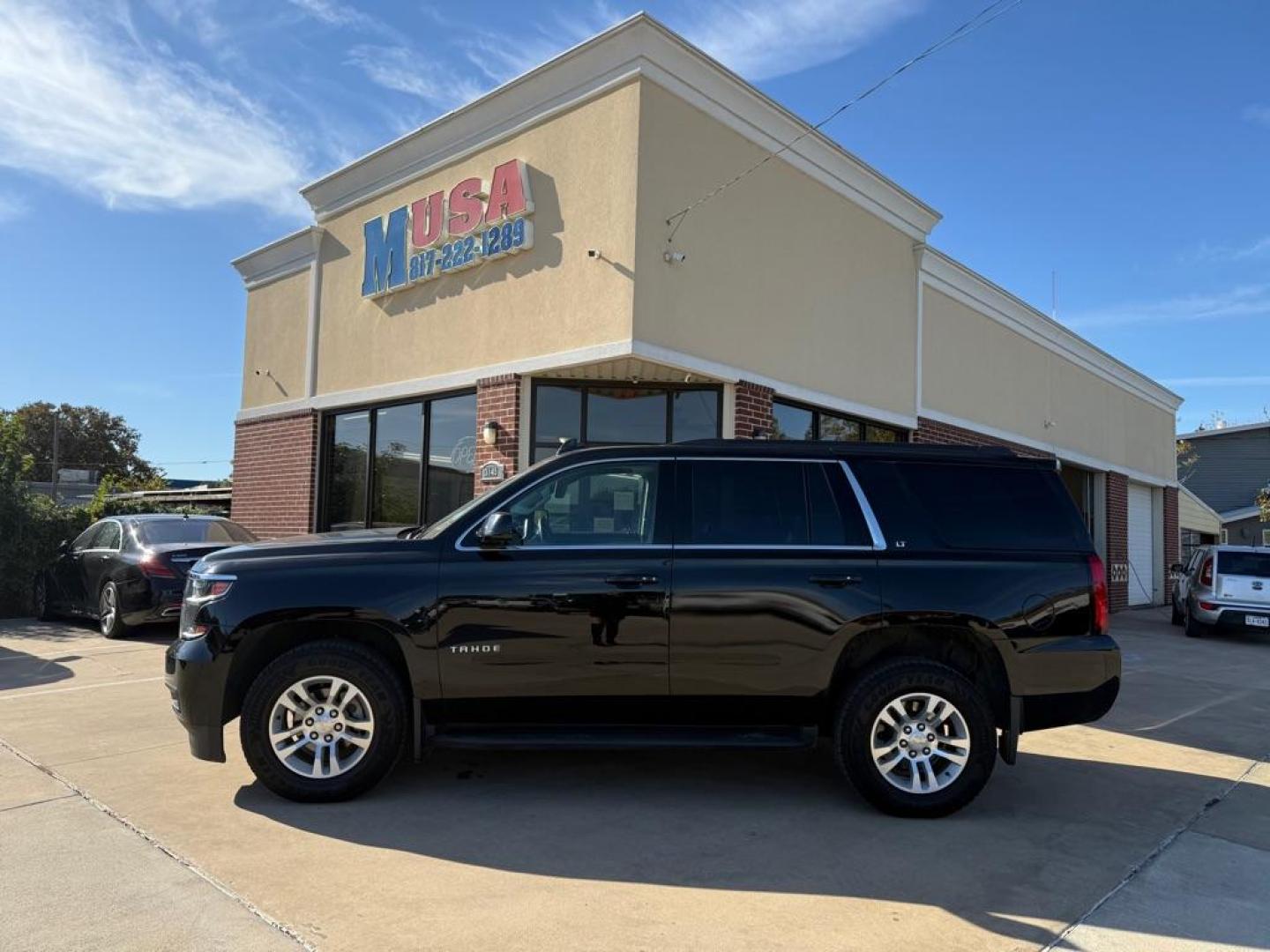 2017 Black CHEVROLET TAHOE 1500 LT (1GNSKBKC3HR) with an 5.3L engine, Automatic transmission, located at 4415 NE 28th St, Haltom City, TX, 76117, (817) 222-9334, 32.795322, -97.280937 - Photo#0