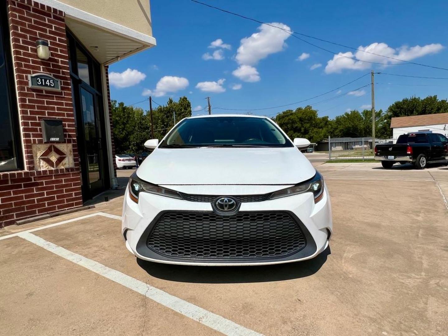 2021 White TOYOTA COROLLA L (5YFDPMAE7MP) with an 1.8L engine, Continuously Variable transmission, located at 4415 NE 28th St, Haltom City, TX, 76117, (817) 222-9334, 32.795322, -97.280937 - Photo#1