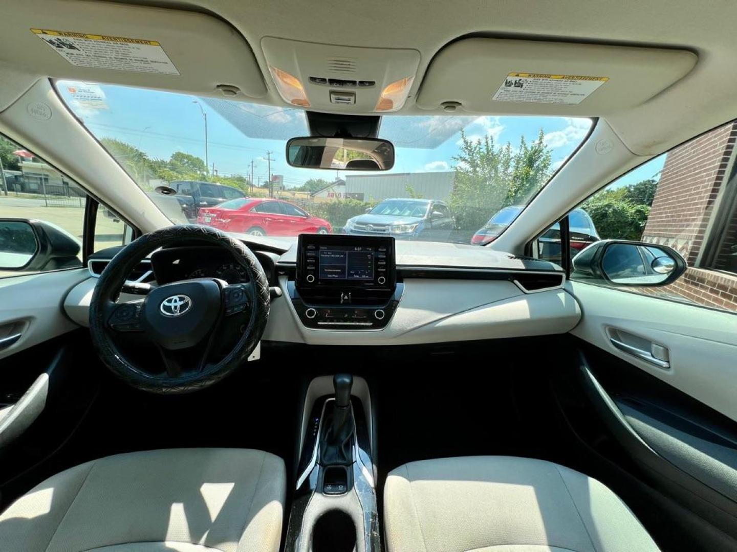 2021 White TOYOTA COROLLA L (5YFDPMAE7MP) with an 1.8L engine, Continuously Variable transmission, located at 4415 NE 28th St, Haltom City, TX, 76117, (817) 222-9334, 32.795322, -97.280937 - Photo#7