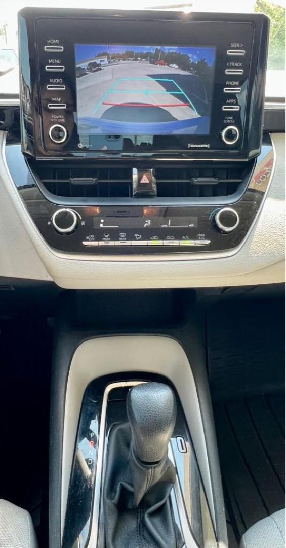 2021 White TOYOTA COROLLA L (5YFDPMAE7MP) with an 1.8L engine, Continuously Variable transmission, located at 4415 NE 28th St, Haltom City, TX, 76117, (817) 222-9334, 32.795322, -97.280937 - Photo#9
