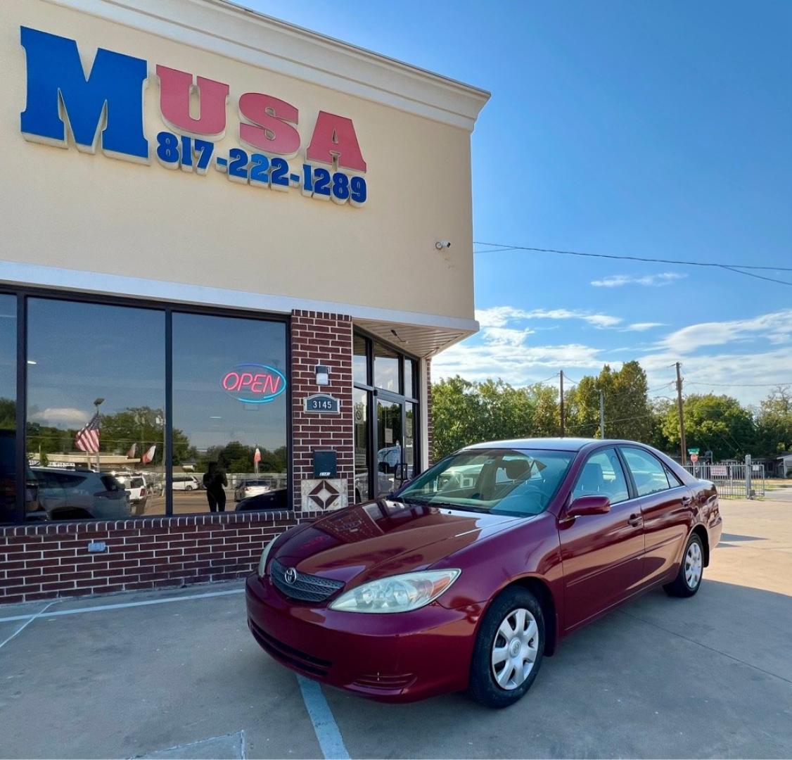 2004 Red TOYOTA CAMRY LE (4T1BE32K84U) with an 2.4L engine, Automatic transmission, located at 4415 NE 28th St, Haltom City, TX, 76117, (817) 222-9334, 32.795322, -97.280937- Photo#0