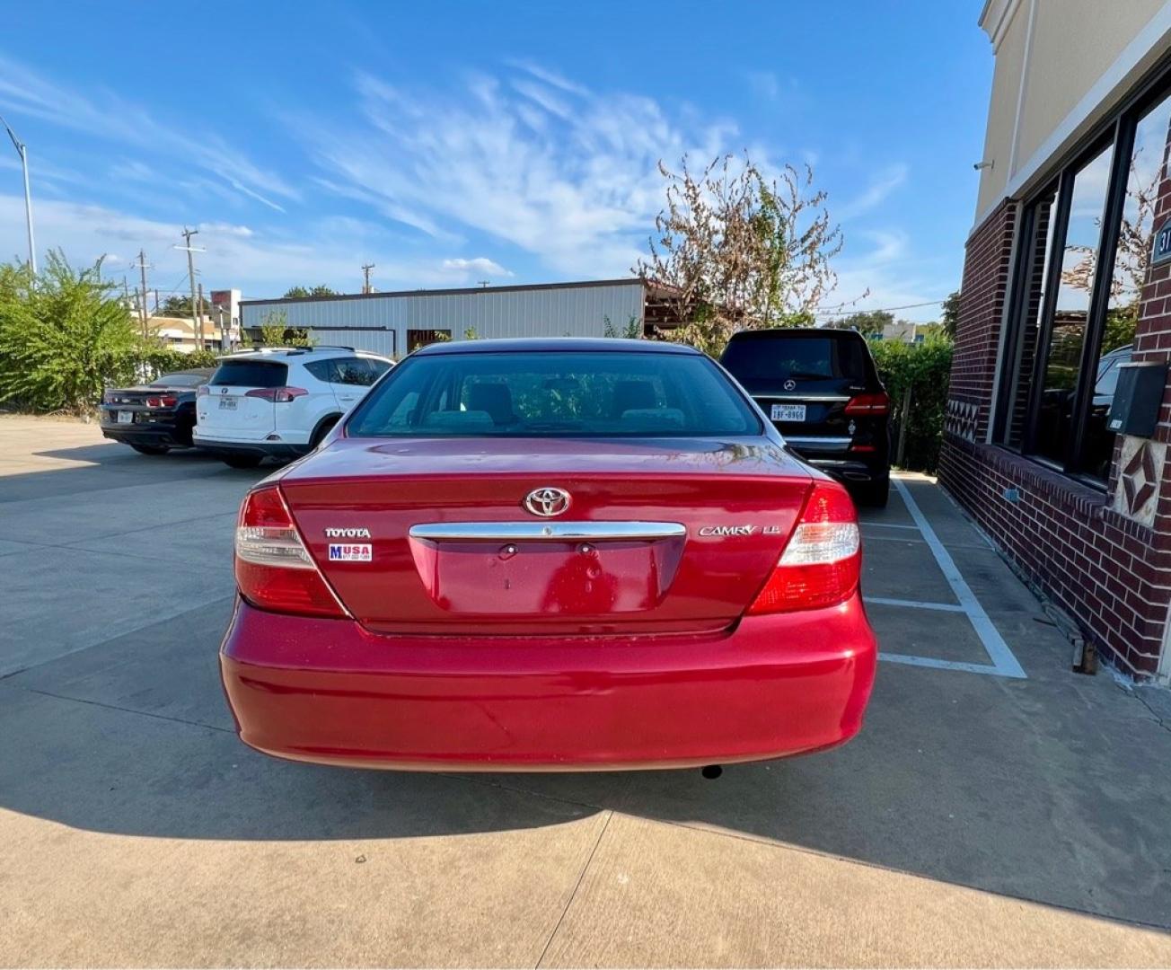 2004 Red TOYOTA CAMRY LE (4T1BE32K84U) with an 2.4L engine, Automatic transmission, located at 4415 NE 28th St, Haltom City, TX, 76117, (817) 222-9334, 32.795322, -97.280937- Photo#4