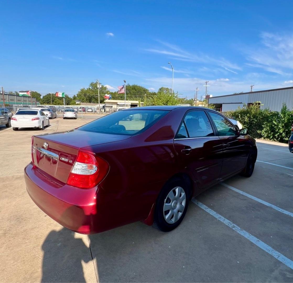 2004 Red TOYOTA CAMRY LE (4T1BE32K84U) with an 2.4L engine, Automatic transmission, located at 4415 NE 28th St, Haltom City, TX, 76117, (817) 222-9334, 32.795322, -97.280937- Photo#5